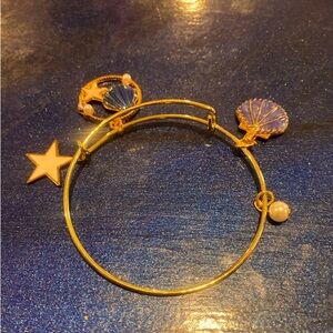 Goldtone Ocean charm bracelet